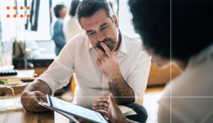 Man pondering at service desk